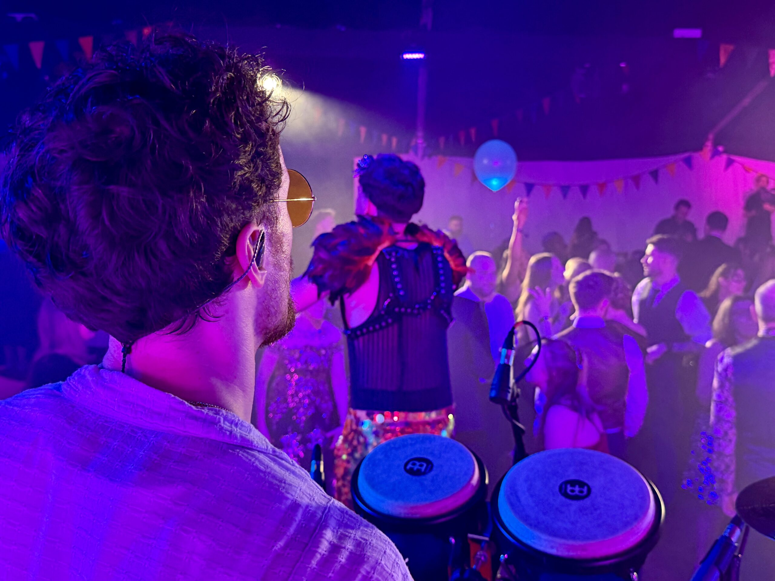 Urban Soul Orchestra — Crowd Atmosphere Urban Soul Orchestra percussion view of a dancing crowd at an event