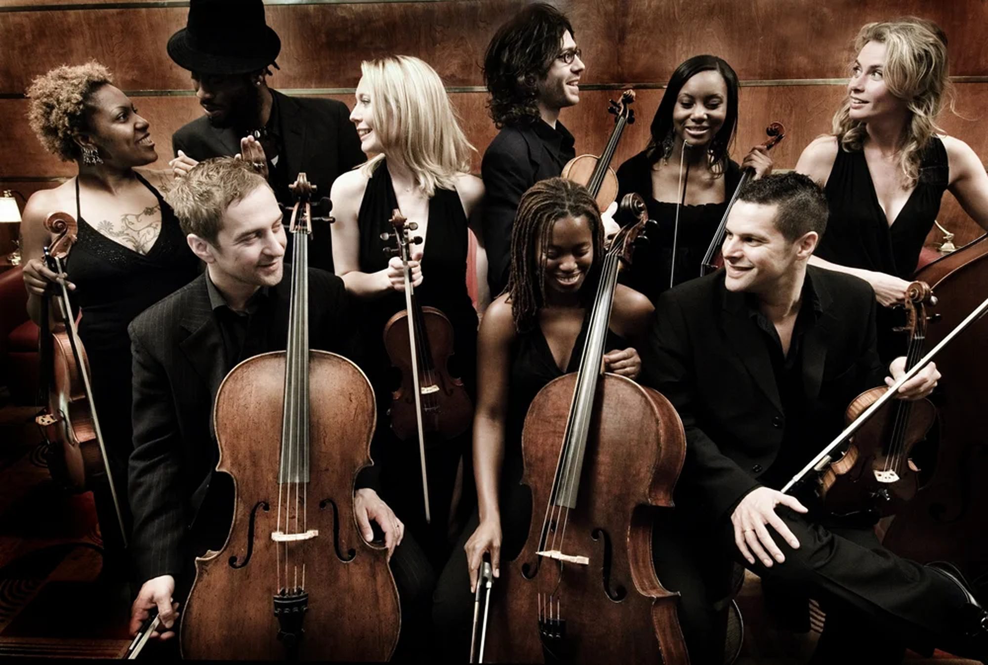 Classic String Quartet — Extended Ensemble Formal portrait of a ten-piece string and vocal ensemble