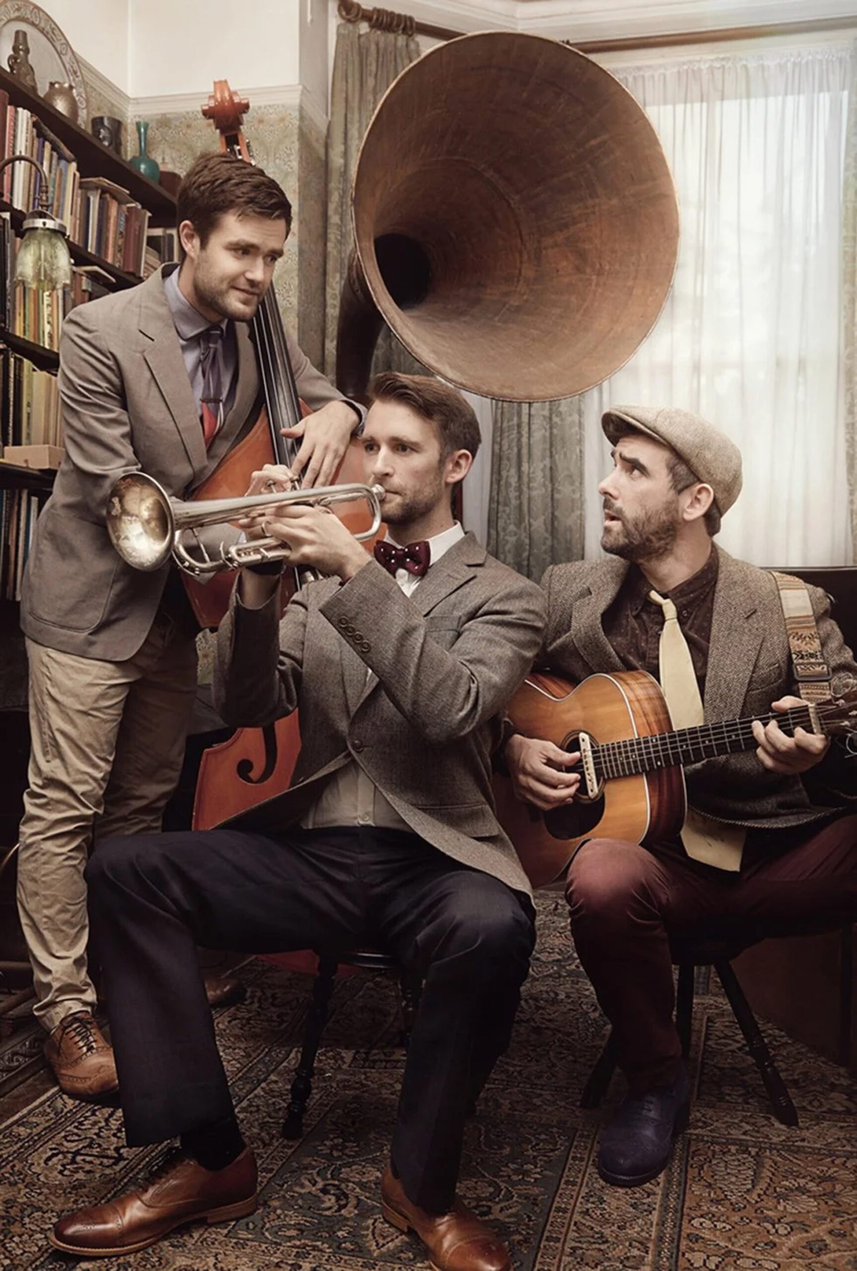Jazz Band trio in vintage styling with trumpet, double bass and guitar
